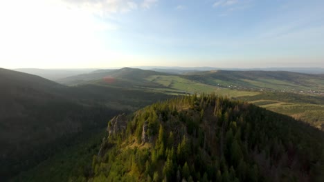 first-person drone ride along a green valley in eastern tatras slovakia