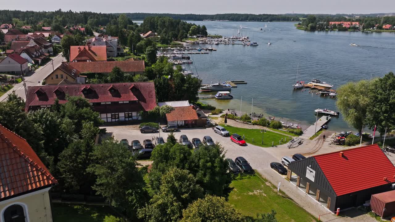 Drone cinematic shot of Rydzewo combines sailing tourism with cultural heritage