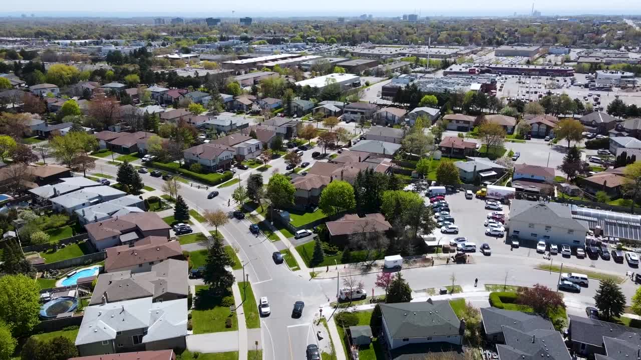Drone flying over homes on a spring day in Mississauga
