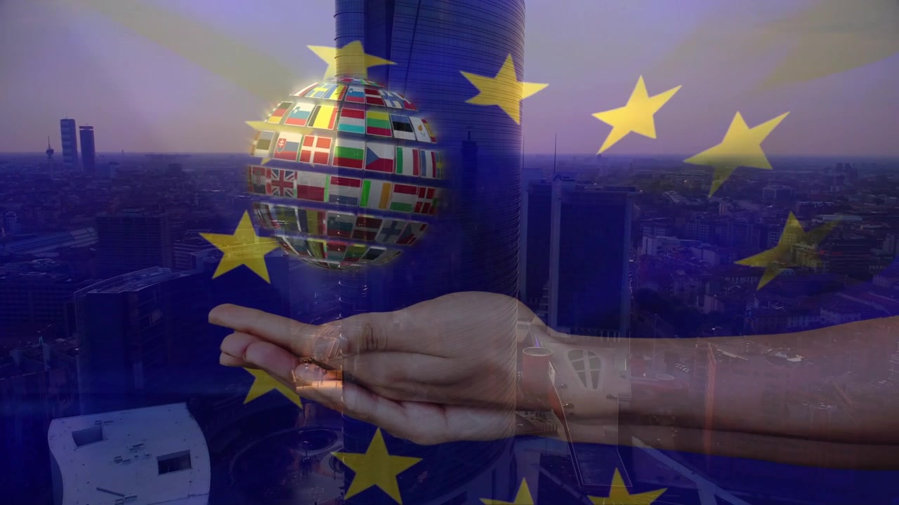 Sovrapposizione UE che appare gradualmente, mano che entra, globo con bandiere che si forma sopra il palmo, ruota, sfuma, mostrando unità