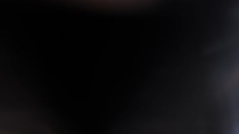 la luz multicolor filtra imágenes de 4k sobre fondo negro, vídeo estilizado, transiciones, efecto bokeh