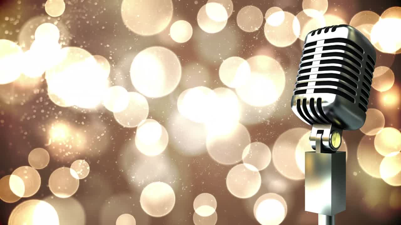 灰色の背景に黄色い光の斑点を照らすレトロメタリックマイク