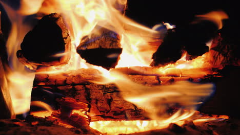 bright fire hot wood give a strong heat 4k video