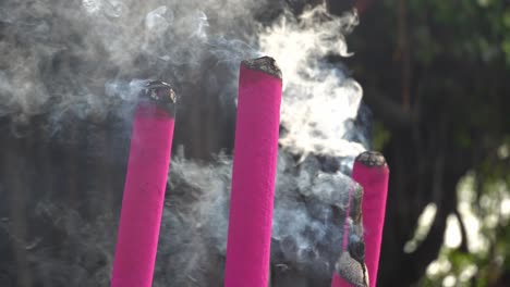 Red-joss-stick-release-smoke-during-burn