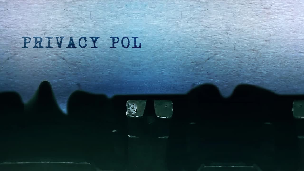 Privacy policy word closeup being typing and centered on a sheet of paper on old vintage typewriter