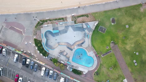 top-down shot of bondi skate park at bondi beach in sydney, australia - aerial drone