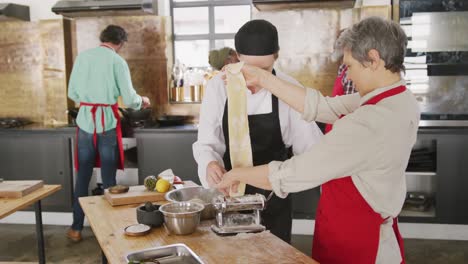 chefs making pasta dough