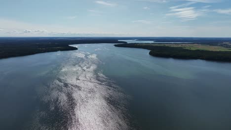 panoramic view, the sun's rays sparkle in the big lake, and the indescribably beautiful nature of the baltic countries