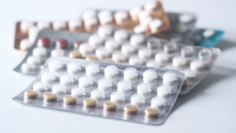 close-up of various pills and tablets in blister packs