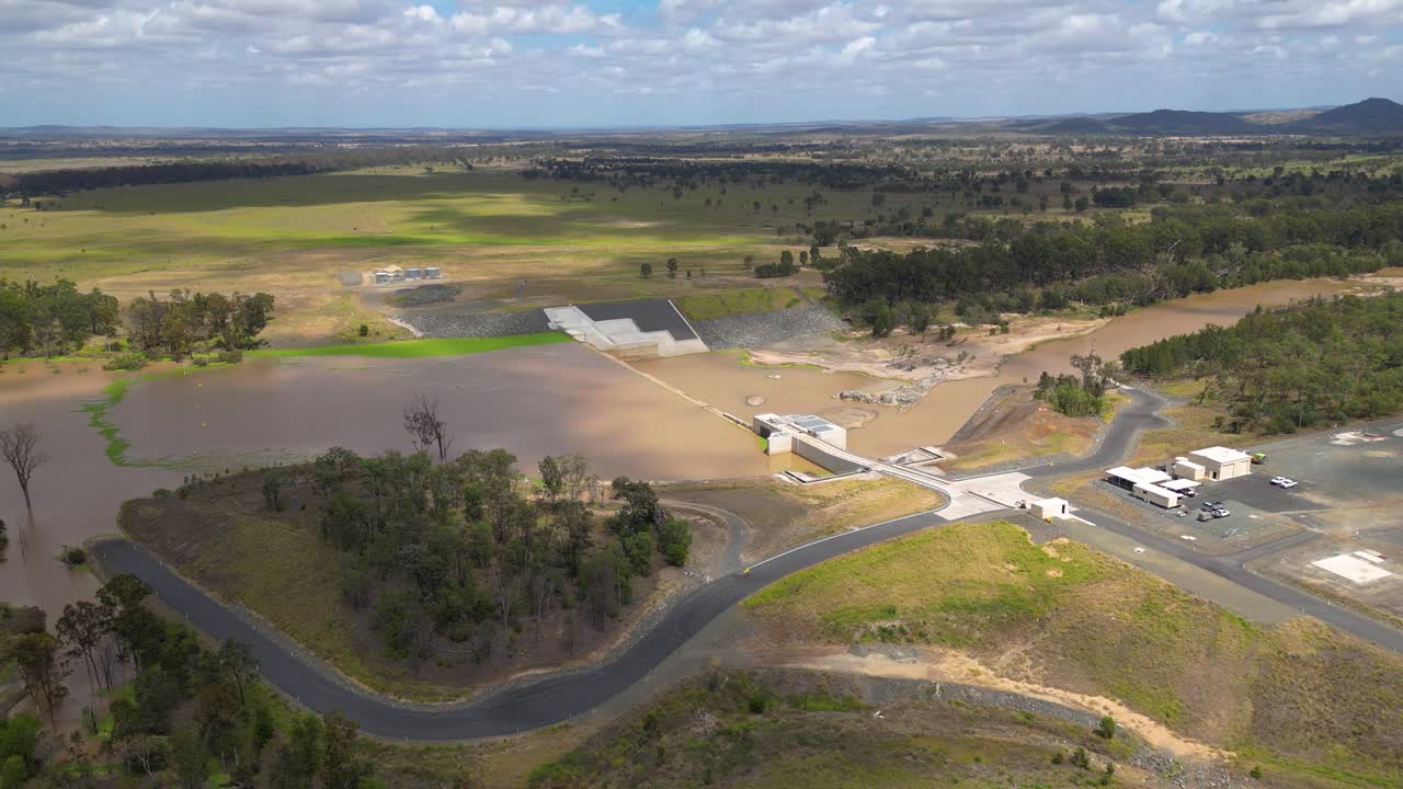 Left to right aerial views over Rookwood Weir and the Fitzroy River, West of Rockhampton, Central Queensland, Australia.
