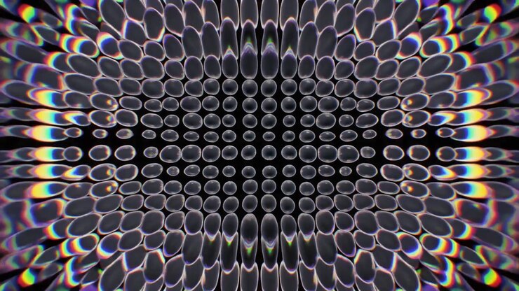 Animação Gráfica Abstrata de Esferas Iridiscentes Luminosas Expandindo e Contraindo