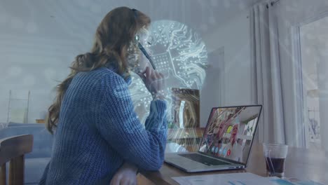 Animación-De-Cabeza-Humana-Digital,-Red-De-Conexiones-Sobre-Mujer-Usando-Laptop-En-Videollamada