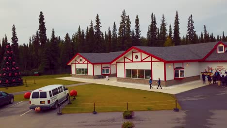 4K-Drone-Video-of-Christmas-Tree-at-Santa-Claus-House-in-North-Pole,-Alaksa-during-Summer-Day