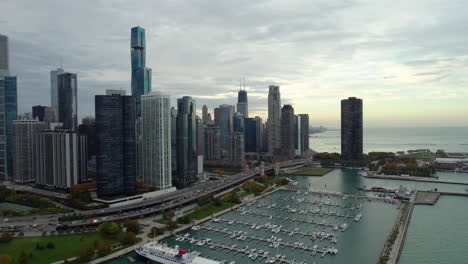 Aerial-view-circling-the-New-Eastside-lakefront,-fall-evening-in-Chicago