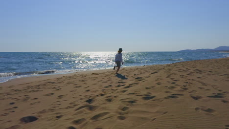 woman running on the beach