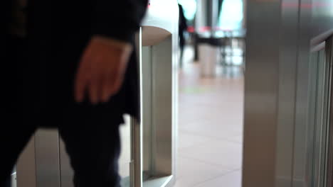 person walking through security gate