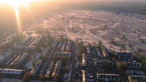 groevenbeekse heide suburbs real estate area by park in winter, sunset, aerial