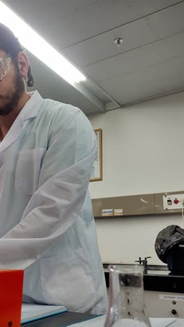 scientist performing laboratory procedure