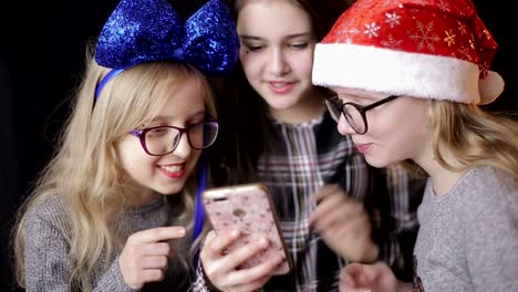Friendship Technology and Internet Concept three Young Medium Shotfriendship Technology and Internet Concept three Young Women with Smartphones Outdoors Professional Shot in Resolution 33 you can Use it eg in your Commercial Video Medical Business Presentation Broadcast