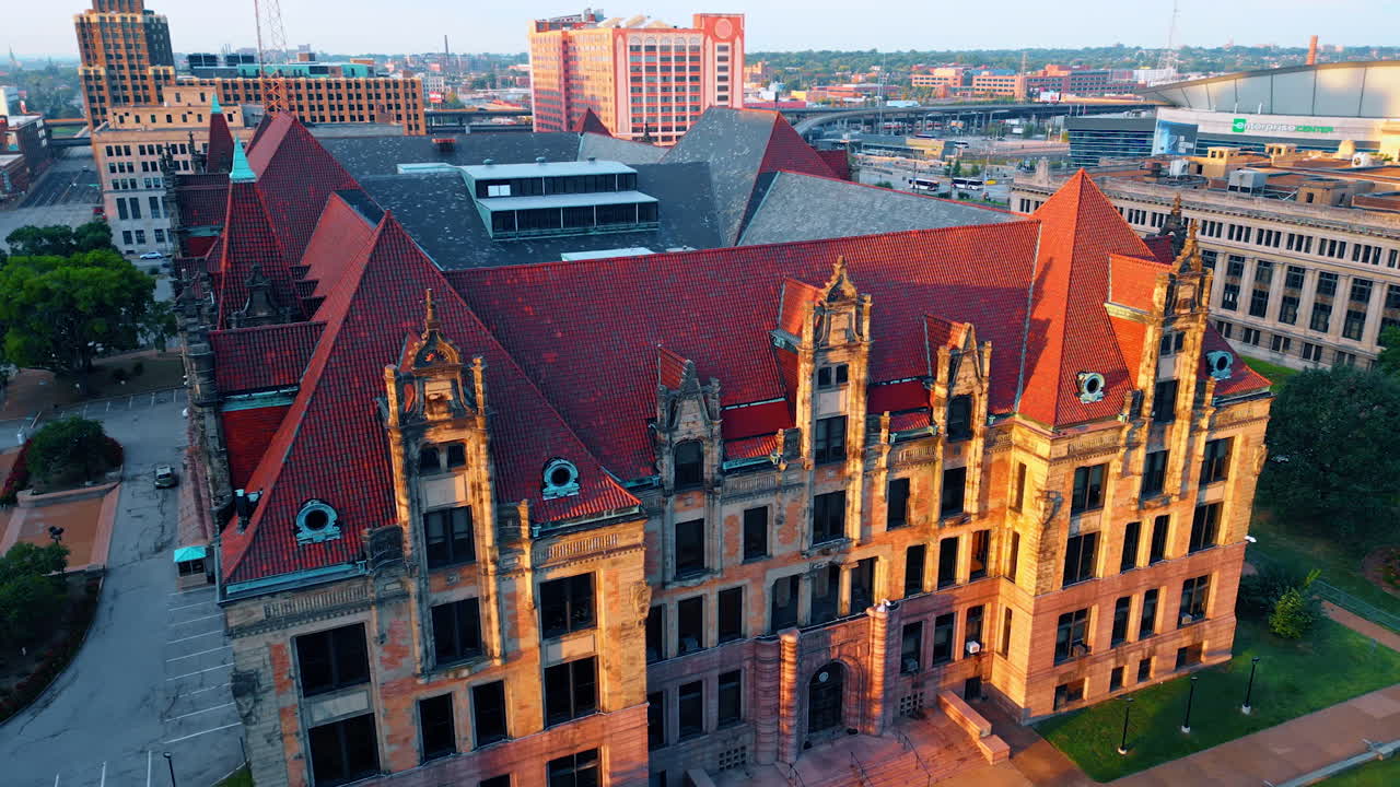 Saint Louis USA, 14 August 2025: Setting sun illuminates a beautiful building of St. Louis City Hall. Aerial perspective on the historical architectural monument at cityscape at backdrop