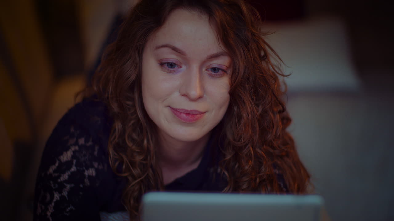 Young Woman Laying On Softa While Doing Online Shopping On Digital Tablet Computer At Home 2