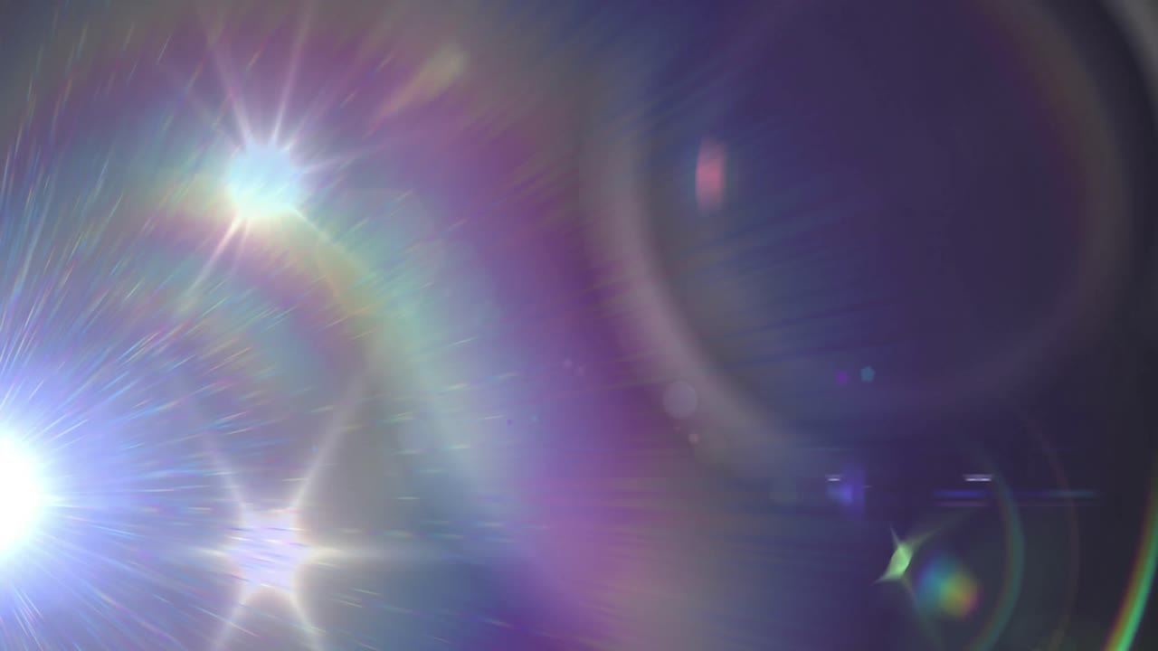 Animation of spotlight with lens flare over dark background