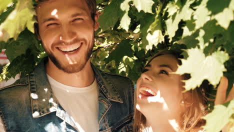 happy couple underneath a tree