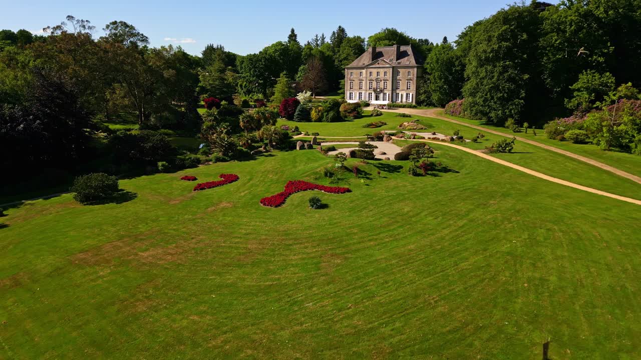Chateau De La Foltiere, Parc de Haute Bretagne, France. Aerial forward at low altitude, lateral view