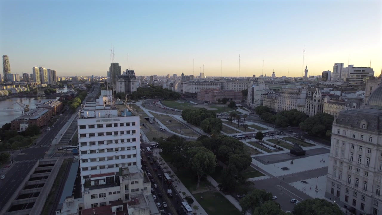4K drone aerial view of Puerto Madero and Casa Rosada in Buenos Aires, Argentina. Modern waterfront blending with the city’s historic presidential palace and urban skyline.