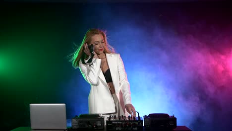 female dj performing on stage