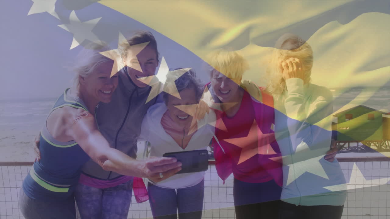 Smiling group of women taking selfie over American flag animation