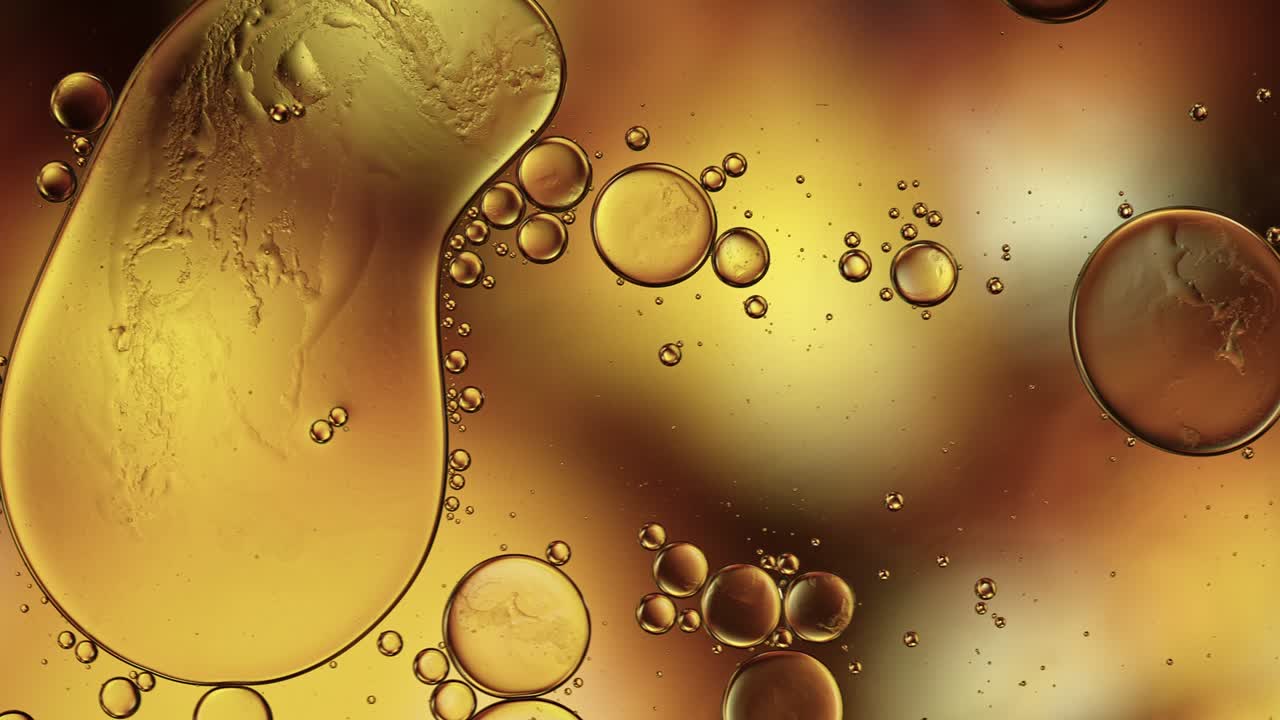 абстрактные красочные пищевые капли масла пузырьки и сферы текут