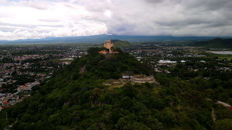 rapid view of church and volcano in atlixco