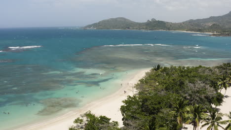 aerial - white sand beach paradise, playa teco maimon, dominican republic, reverse