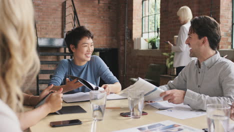 Steadicam-shot-in-of-diverse-business-team-meeting