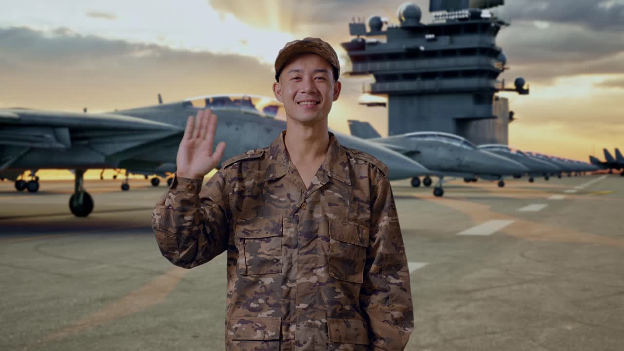 Military Personnel on Aircraft Carrier at Sunset