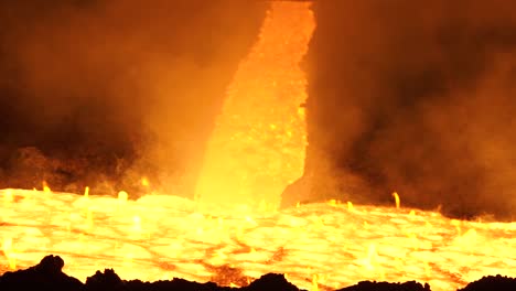 molten metal pouring into furnace