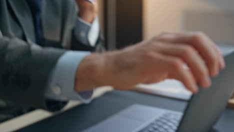 man fingers typing keyboard shutting laptop at desk closeup. tired boss break