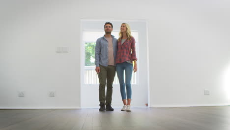 Excited-Young-Couple-Moving-Into-New-Home-Together