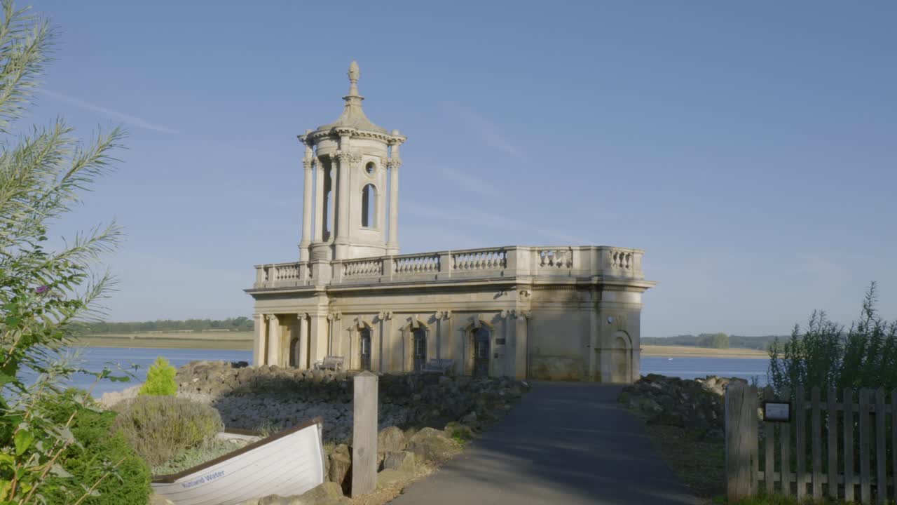 Normanton Church by Rutland Water, serene sunny day, tranquil mood