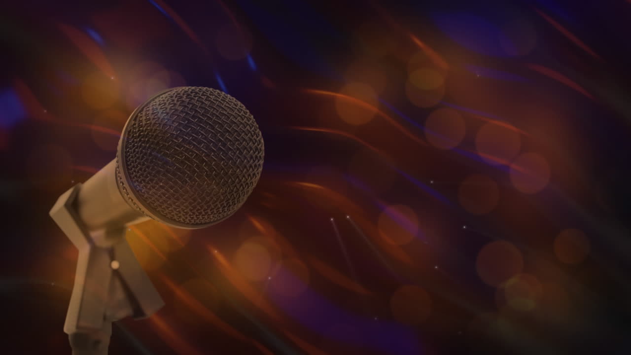 Microphone against spots of light in background