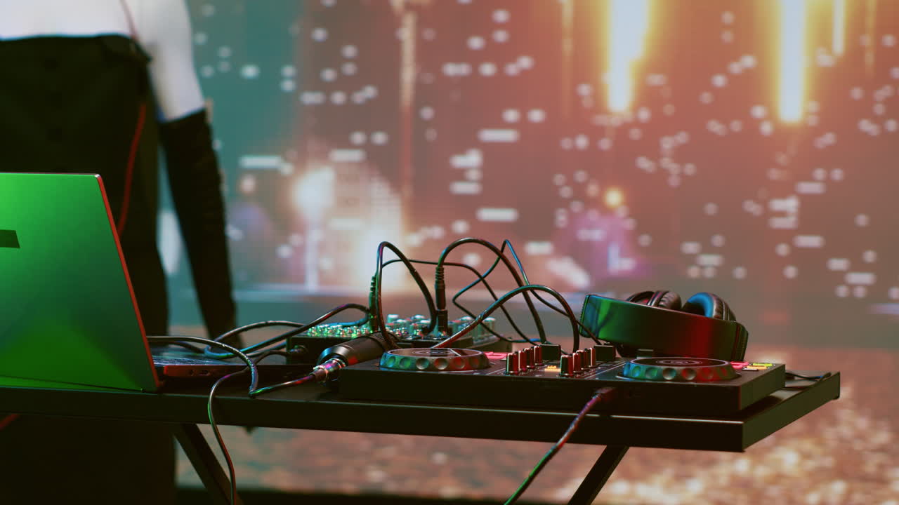 DJ setup with laptop and sound mixer