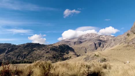 a timelapse of clouds rolling over the peak of iztaccíhuatl, the third highest mountain in mexico