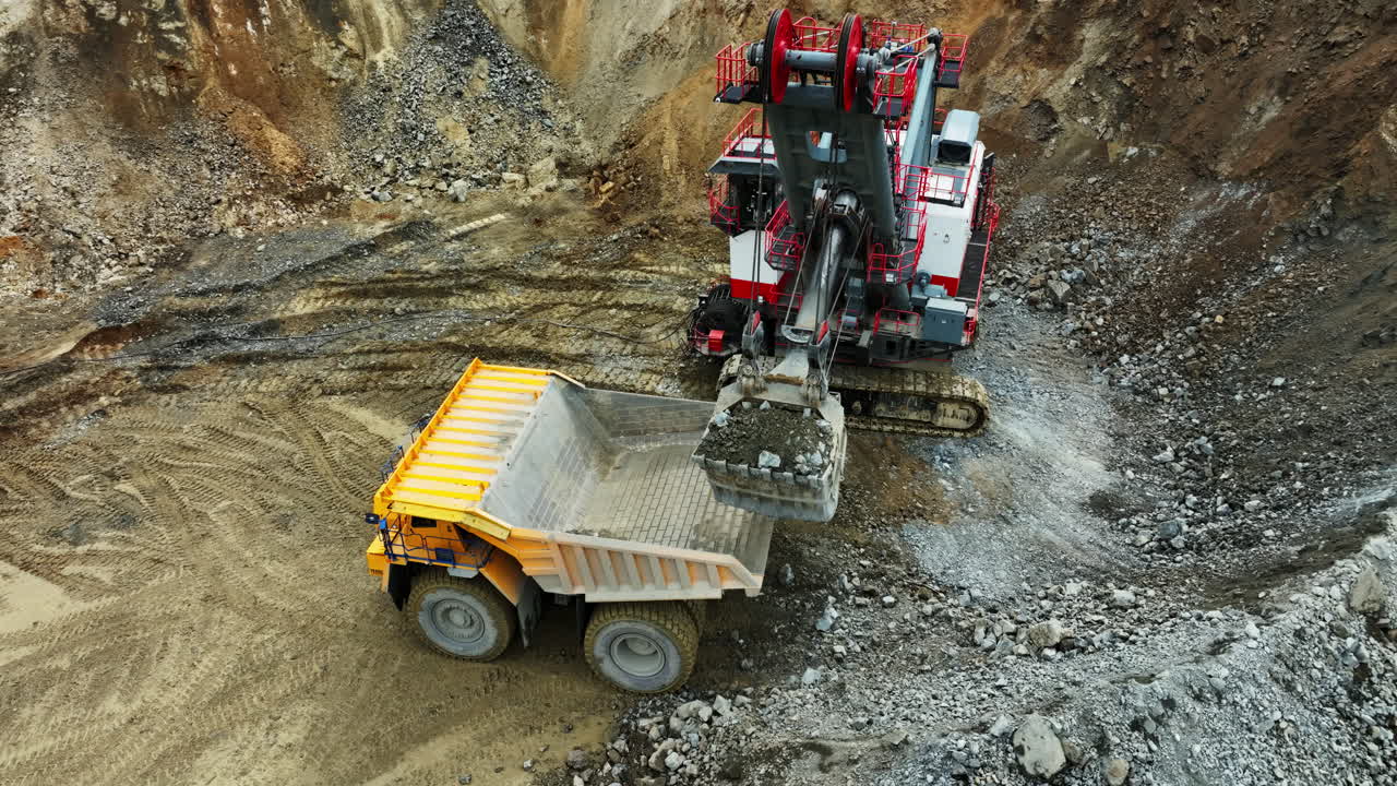 Open-Pit Mine Operation with Excavator and Dump Truck