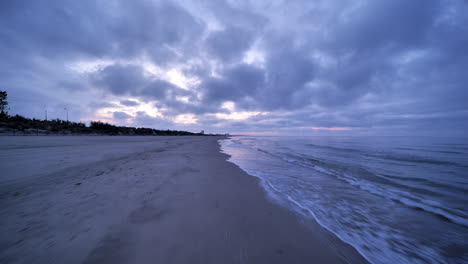 Glassy-mediterranean-sea-traveling-first-person-view-shot--on-a-beach-France