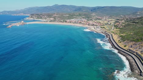 Carretera-Costera-Y-Bahía-Azul-En-Bosa-Marina,-Cerdeña,-Italia---Antena-4k