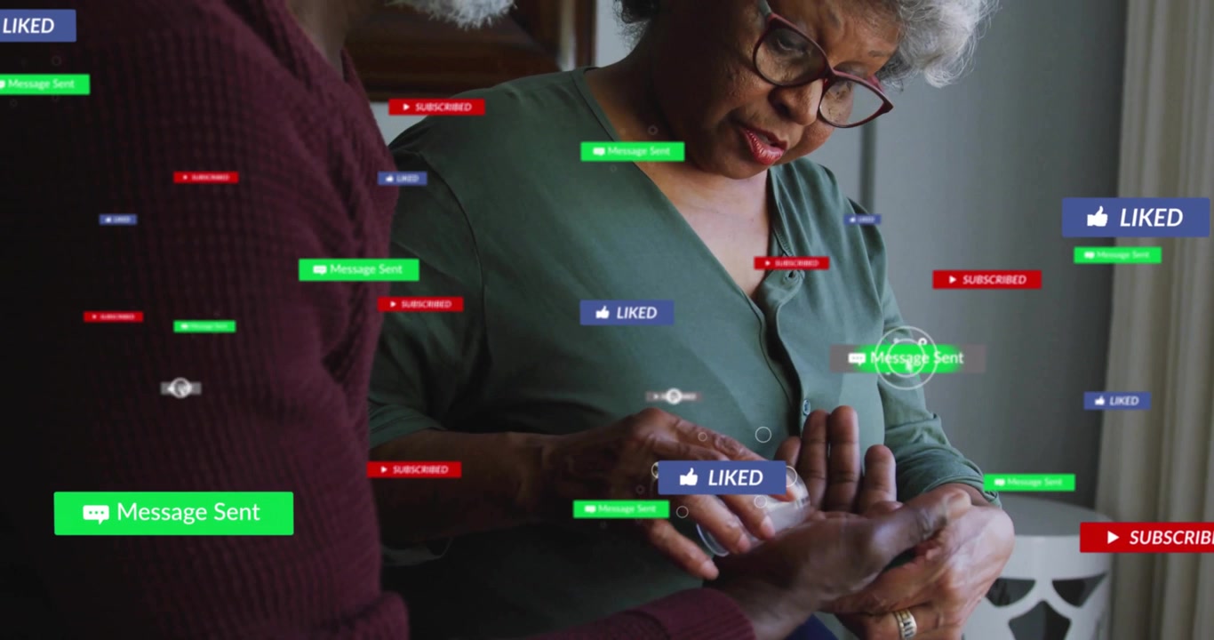 Senior woman pouring pills into man palm for home health care, social media icons floating around