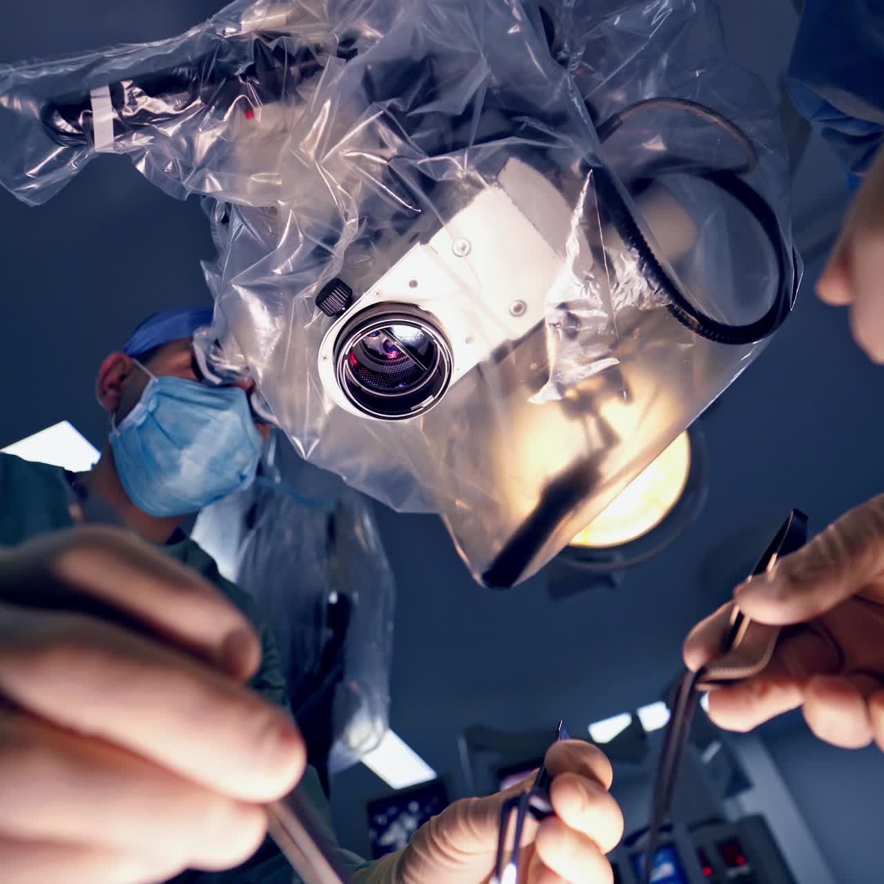 Surgeon operating hands
