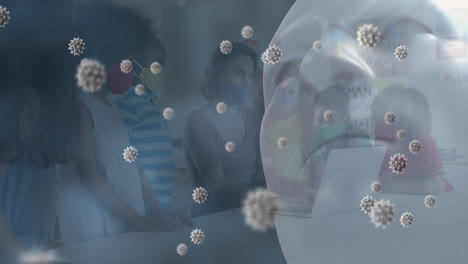 animation of coronavirus cells and model head with teacher and schoolchildren wearing face masks