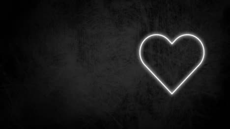 Animation-of-white-neon-heart-flashing-on-a-black-background